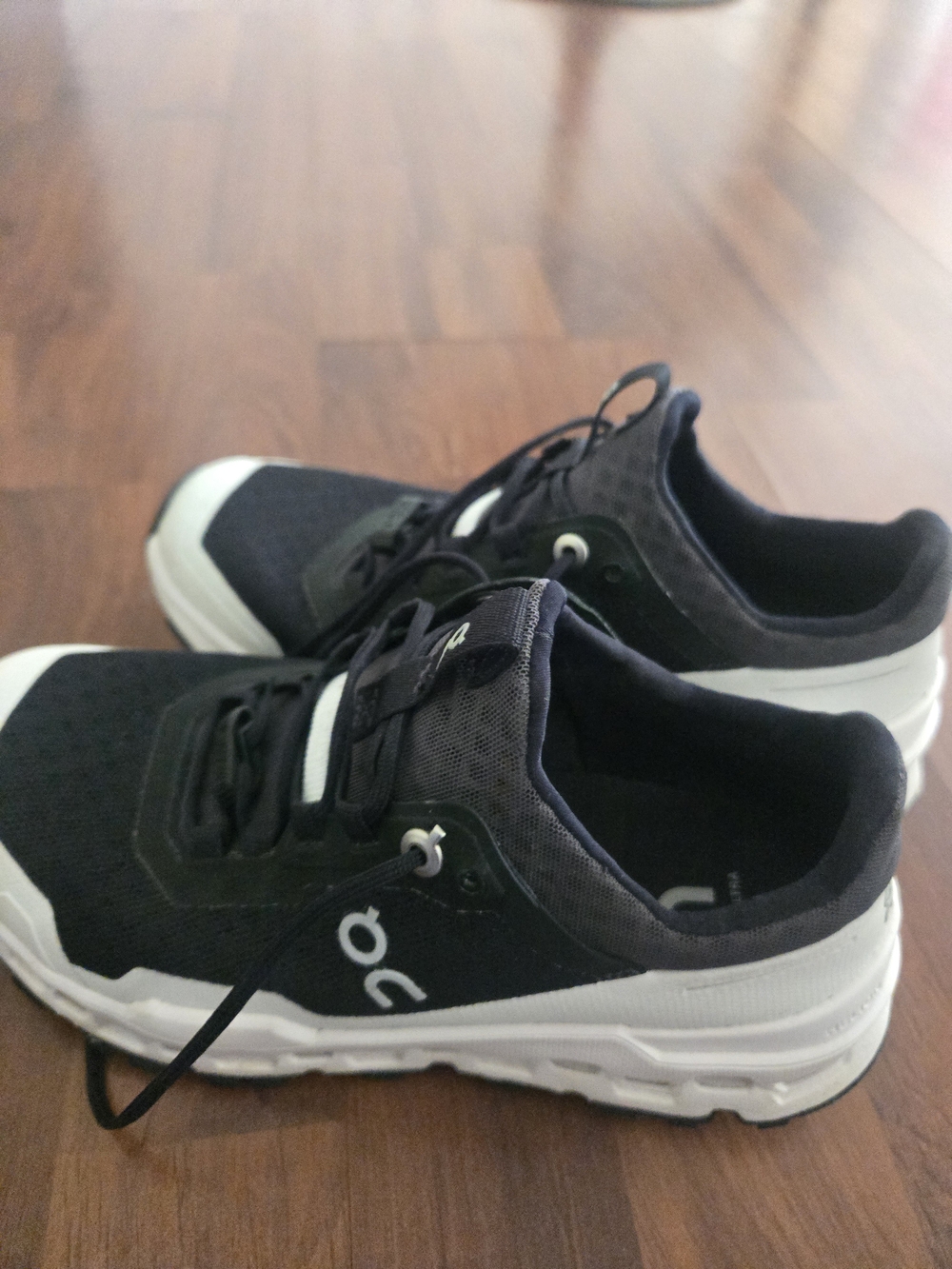 On Running Women's Cloud Black and White Running Shoes